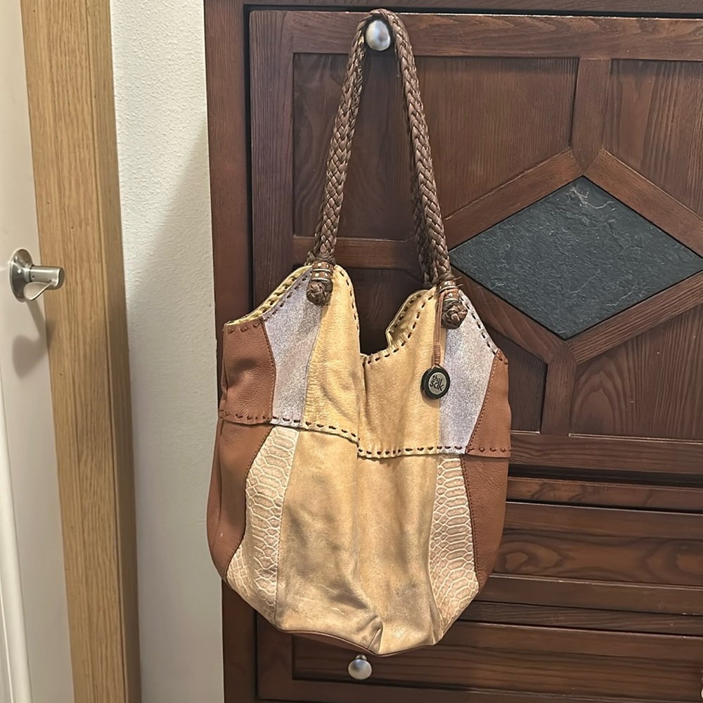 The Sak leather patchwork hobo bag. Brown,with silver highlights.